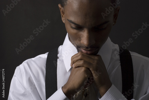 African American businessman is thinking intensely African American businessman is thinking intensely