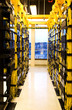 Photo: A shot of network cables and servers in a technology data center A shot of network cables and servers in a technology data center