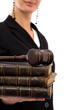 businesswoman holding old book and gavel 