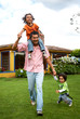 family lifestyle portrait of a dad with their two kids