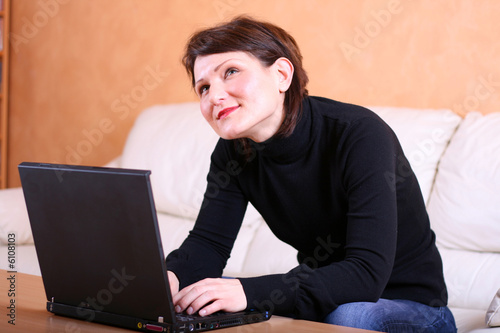 Young lady imagining her chatting partner