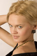 Portrait of the young, beautiful, harmonous blonde 