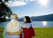 attractive married mature couple enjoying the sunset.