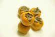 Fresh sharon fruit or persimmon isolated on white background