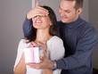couple in love celebrating with a gift 