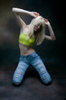 blond girl dancing, studio shot