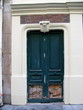 Porte verte murée de bois et briques, Paris Porte verte murée de bois et briques, Paris