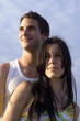 Teenage couple looking ahead