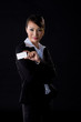 woman in business showing business card