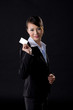 woman in business showing name card