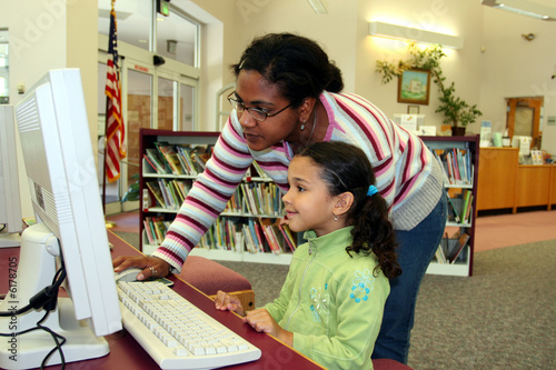 Photo: Child in a school library Child in a school library
