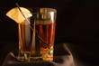 Cocktails, drinks, and alcohol in a colored glass at a bar