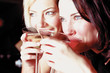Women drinking cocktails