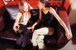Women chatting on sofa