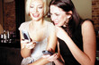Women using mobile phones