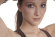 woman with brown hair and brown body warmer