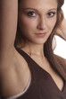 woman with brown hair and brown body warmer