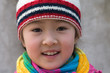 little girl in colorful winter outfits