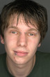 Young man with facial piercings