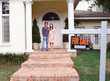Couple near for sale sign