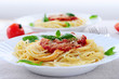 Pasta with tomato sauce basil and grated parmesan