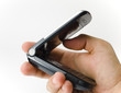 A hand hold a handset