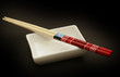 Chopsticks isolated on black