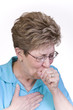 Woman suffering with a bad cough and cold