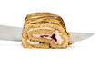 Swiss roll cut by slices isolated on a white background.