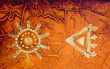 Quadro golden african symbol on textured background