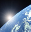 Photo en ligne au meilleur prix Earth with Rising Sun illustration background