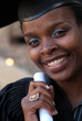 African American college student graduating with mortarboard