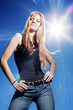 Beautiful girl over blue sky with hot sun.