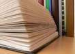Books on table. Veer from book pages