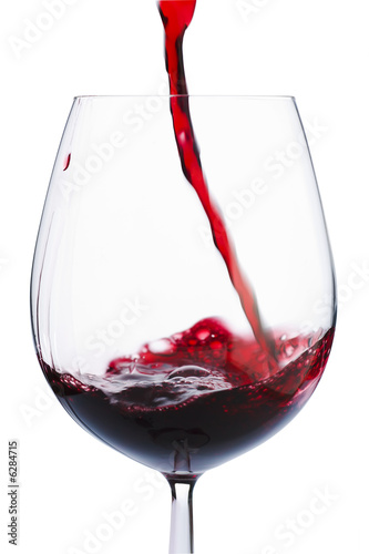 Photo: Badly poured red wine in the glass Badly poured red wine in the glass