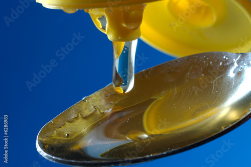 Photo: honey in spoon 03 honey in spoon 03