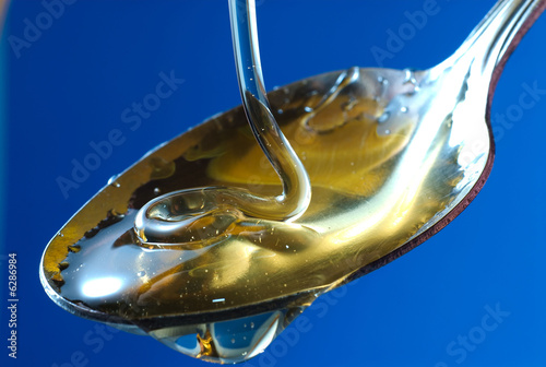 Photo: honey in spoon 02 honey in spoon 02