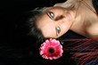 beautiful pink flowers in girl hair beautiful pink flowers in girl hair