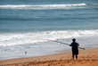 surf fisherman catching fish in Florida