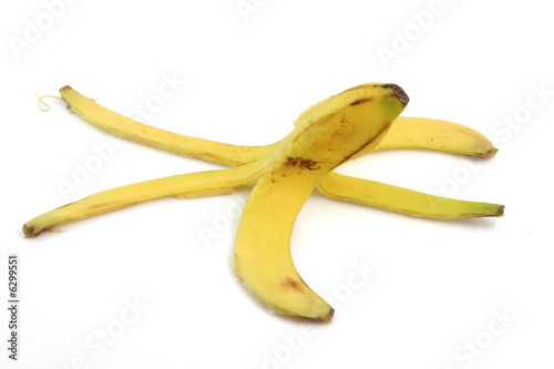 Photo: peel of banana isolated on white background dangerous peel of banana isolated on white background dangerous