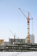 Winter city landscape with under construction buildings.