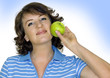 young woman with an green apple