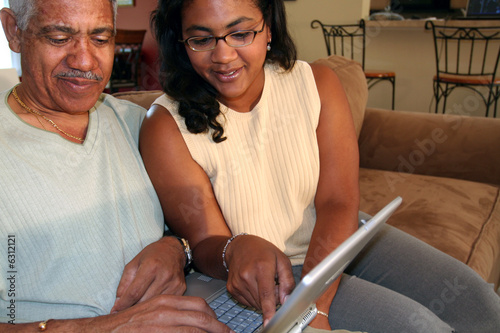 Father and Daughter on Computer