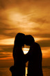 Kissing in Silhouette on the beach