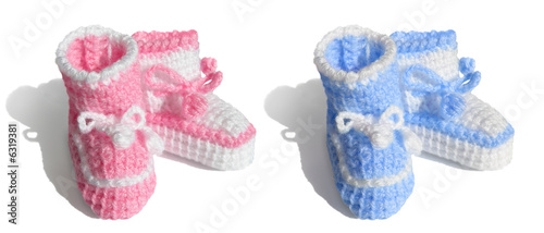Photo: Newborn baby, girl or boy. symbols Tiny bootees - pink, blue Newborn baby, girl or boy. symbols Tiny bootees - pink, blue