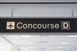 Direction signs in an airport terminal for travelers Direction signs in an airport terminal for travelers