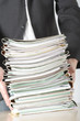 Photo: a businessman holding files a businessman holding files