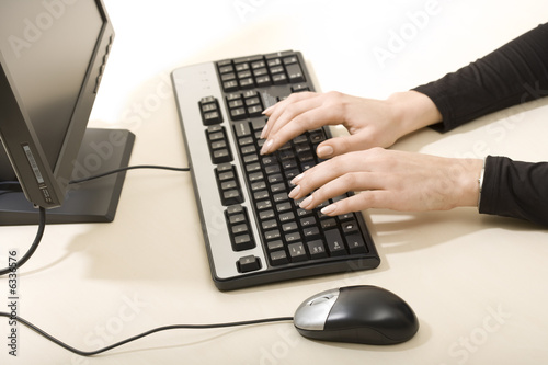 Photo: woman typing woman typing