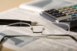 glasses,pen and calculator 