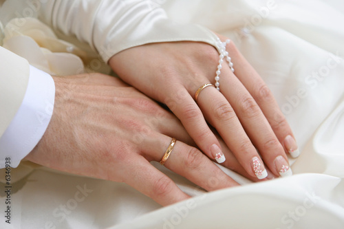 Hands of married couple